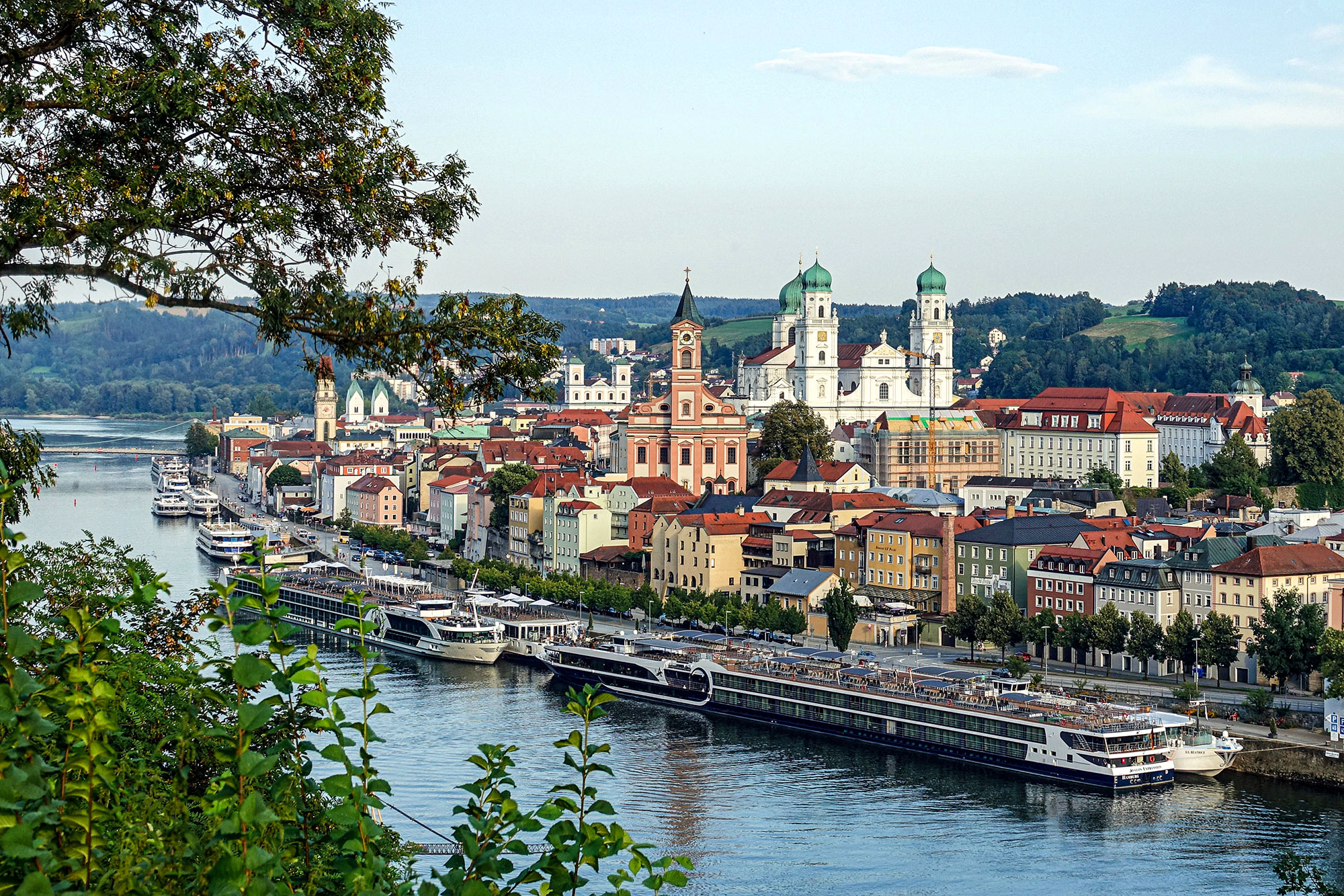 a river with a city and buildings