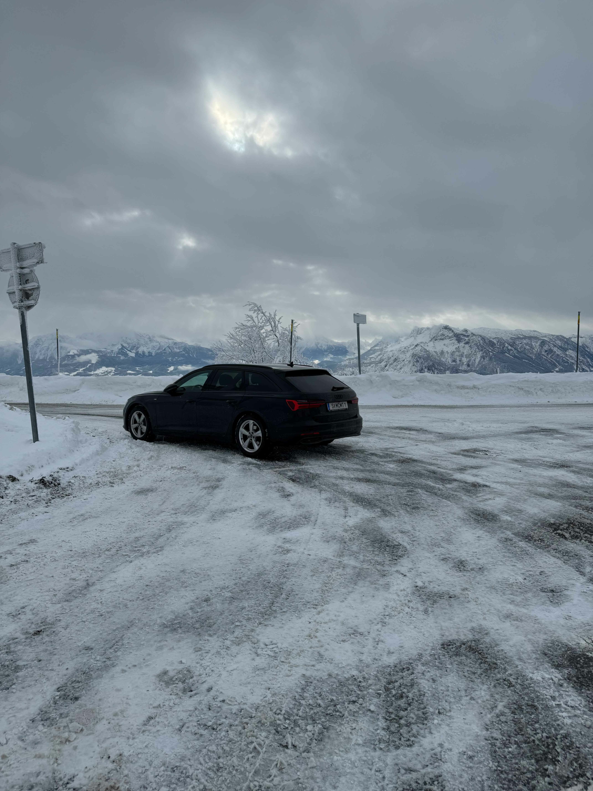 a car parked on a snowy road